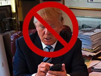 Trump typing on his cell phone with a no sign over his image