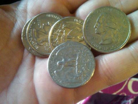 win five quarters on pointless vegas prop bet an open hand with five quarters spread on the palm