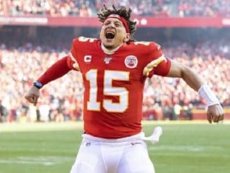 kansas city chiefs quarterback patrick mahomes celebrating on the field