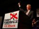 tommy tuberville at the podium after winning the alabama us senate gop primary