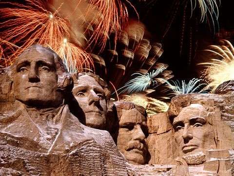 fireworks going off over mount rushmore