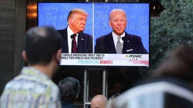 Trump and Biden on screen during debate