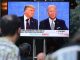 Trump and Biden on screen during debate
