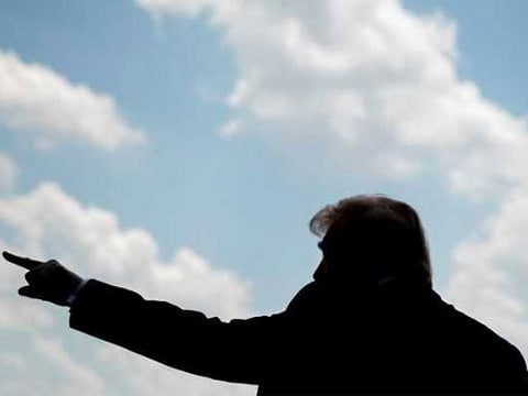 Trump points to the sky
