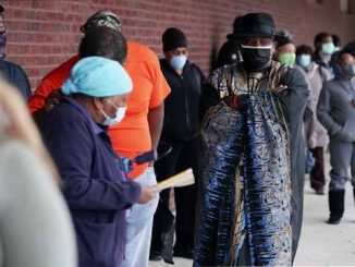 Voters wait in line