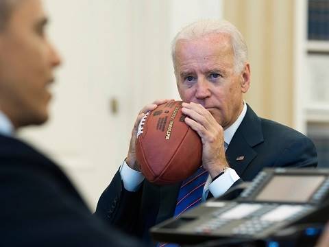 joe biden eating a football