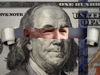 Image of US currency with Biden peeking through Franklin's face